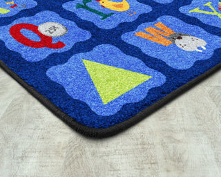 Alphabet Blues 5'4" x 7'8" area rug in color Multi